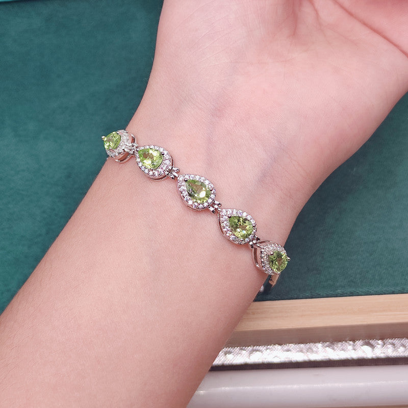 Olivininfattat armband för kvinnor