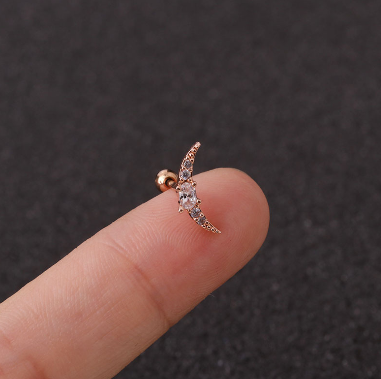 Örhängen i rostfritt stål med stjärnformad zirkon (piercade)