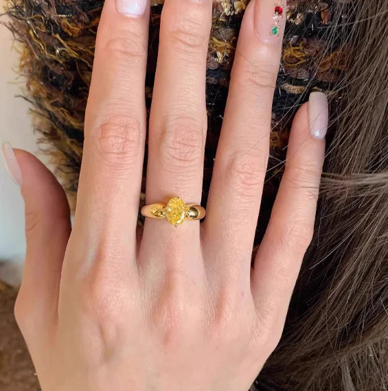 Egg-shaped Yellow Diamond Ring